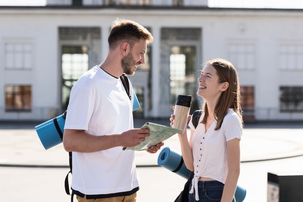 Side view of tourist couple outdoors