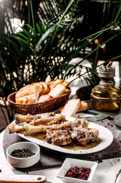 Side view of traditional azerbaijani buglama on a white plate