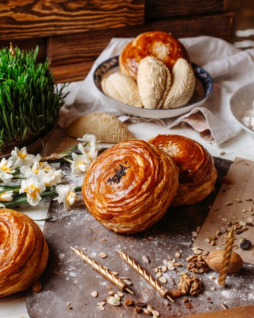 Side view of traditional azerbaijani shorgogal filled with spicy mixture on the rustic with nuts