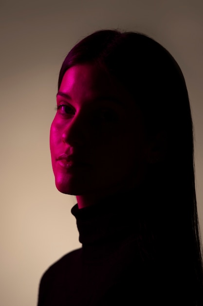 Side view unknown woman posing in studio