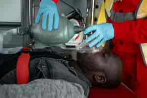 Free photo side view victim with oxygen mask