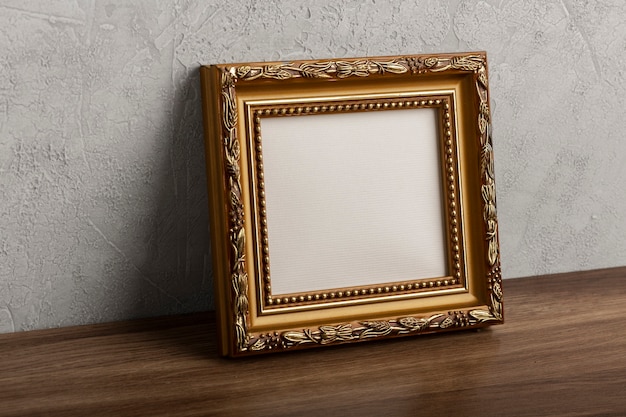 Free photo side view vintage empty frame