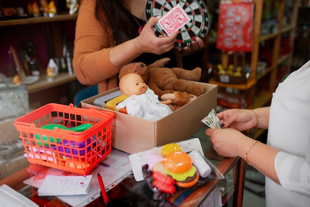 Side view woman bartering goods