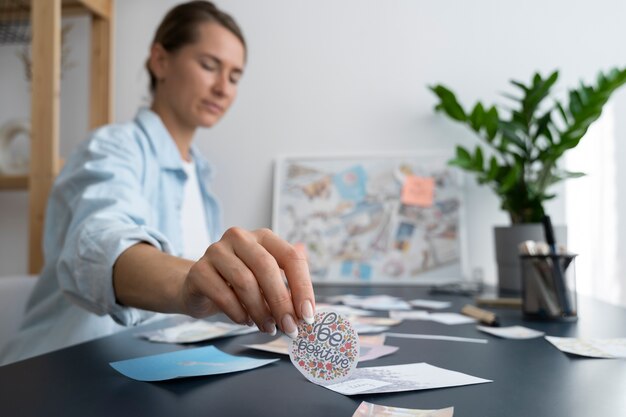 Side view woman creating vision board