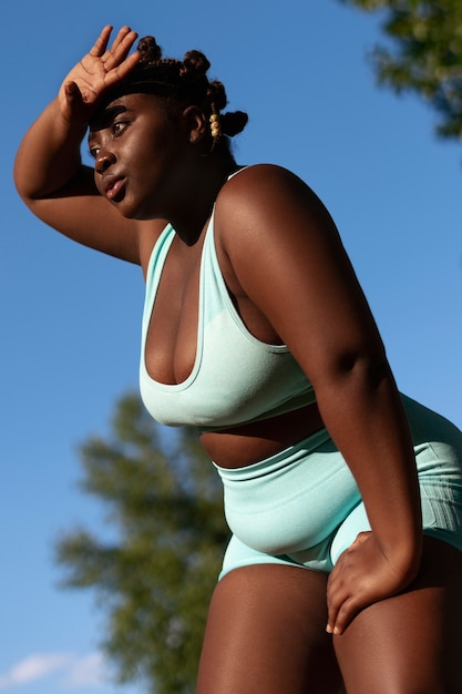 Side view woman doing sport