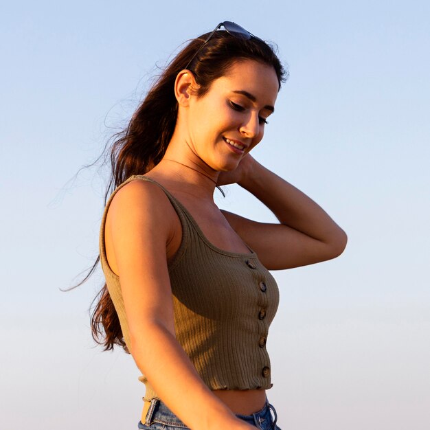 Side view of woman enjoying her time outdoors