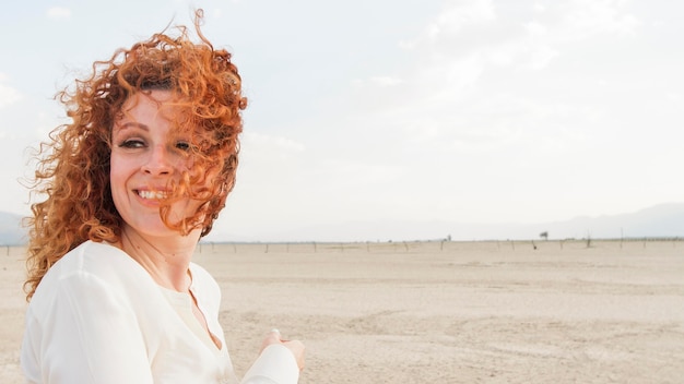 Free photo side view woman enjoying nature