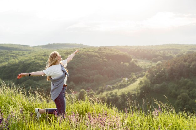 Side view of woman enjoying nature