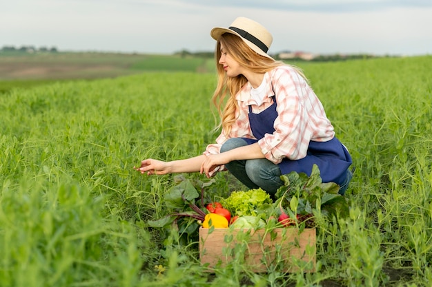 Side view woman at farm