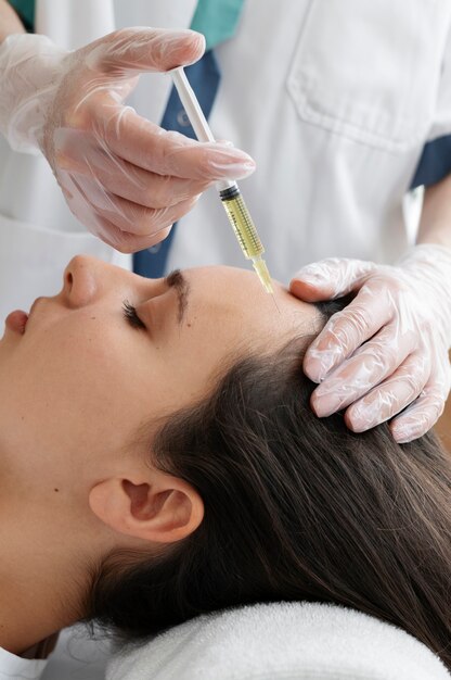 Side view woman getting prp treatment