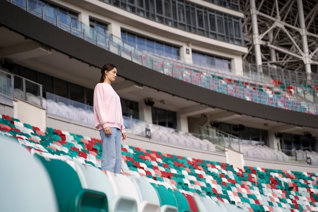 Side view woman on grandstands