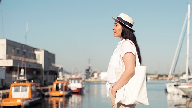 Side view woman in harbor