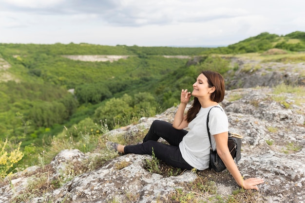 Side view of woman hiking in nature