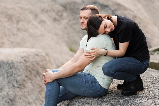 Side view woman holding partner