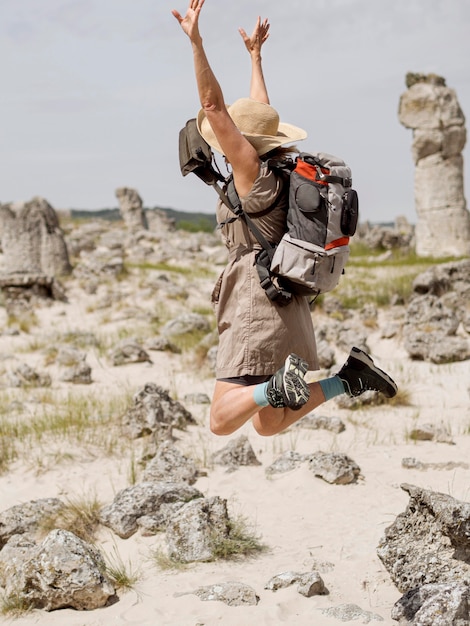 Side view woman jumping