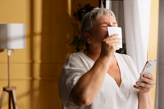 Side view woman kissing lottery ticket