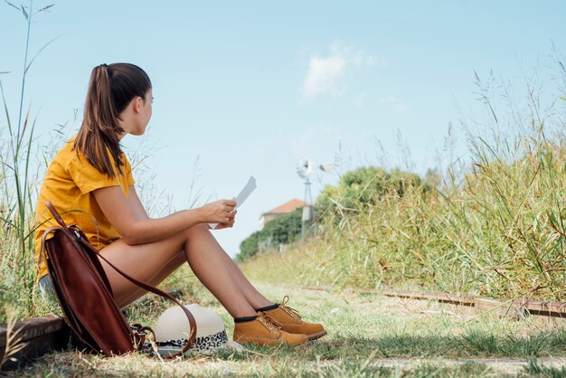 Free Photo side view of woman looking away