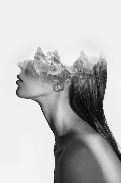 Side view woman and mountains double exposure