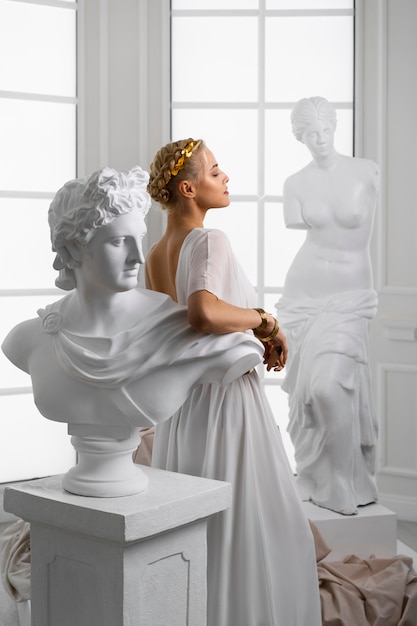 Side view woman posing as greek goddess