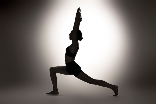 Side view woman posing in studio