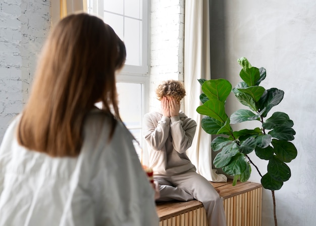 Free Photo side view woman surprising boyfriend