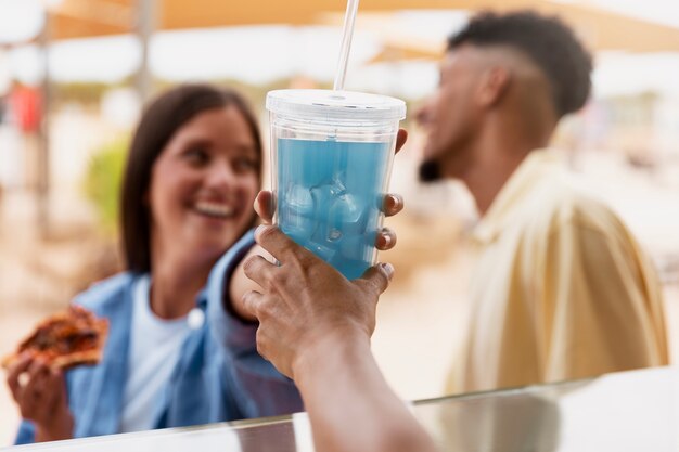 Side view woman taking drink