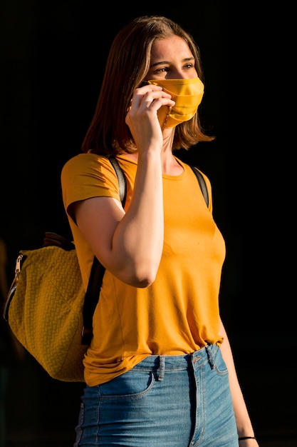 Side view woman talking on the phone