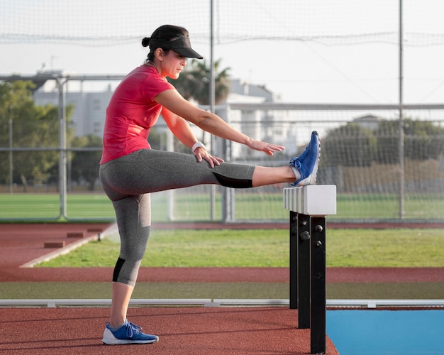 Side view woman training before running