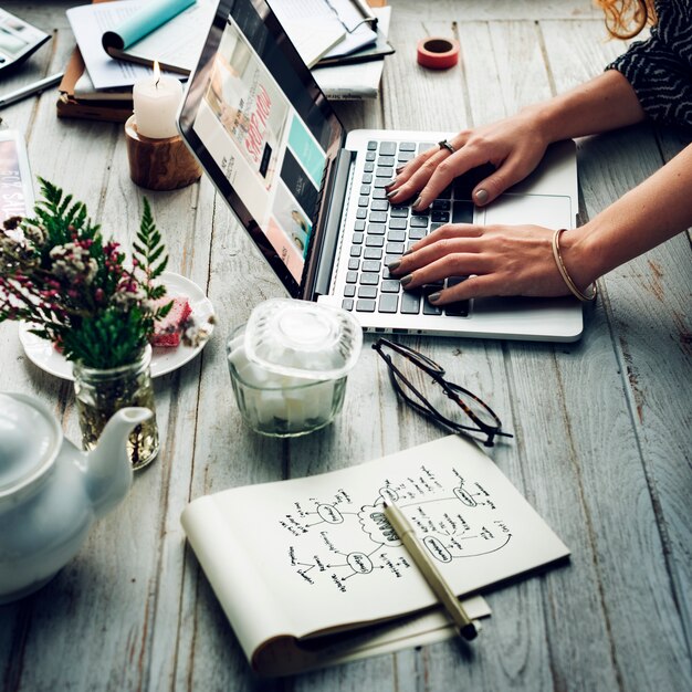 Side view of woman using computer laptop