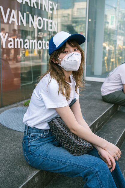 Side view woman wearing face mask