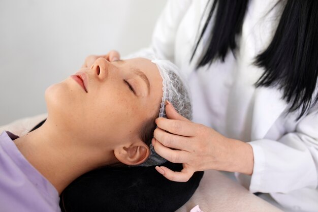 Side view woman wearing hair net