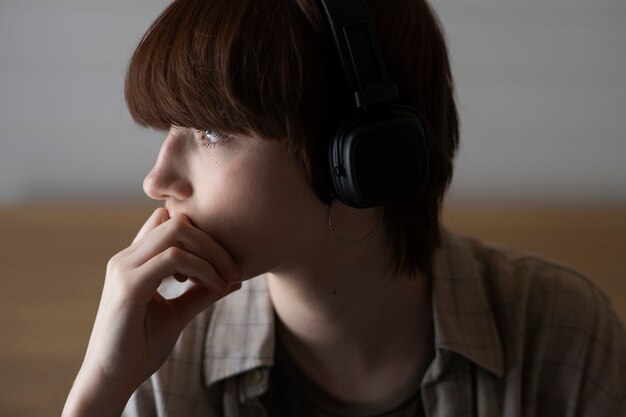 Side view woman wearing headphones