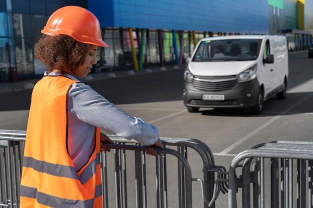 Free photo side view woman wearing helmet