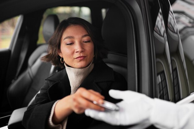 Side view woman with car