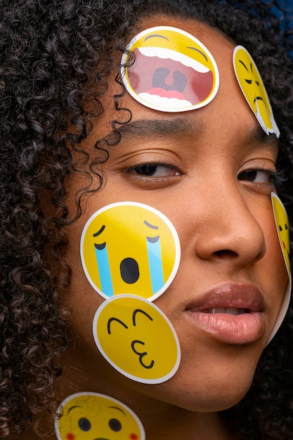 Side view woman with emojis on face