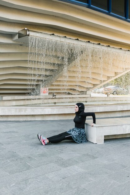 Side view of woman with hijab training