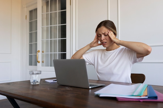 Side view woman with imposter syndrome