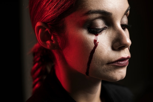 Side view of woman with make-up