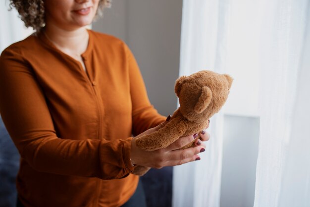 Side view woman with old items