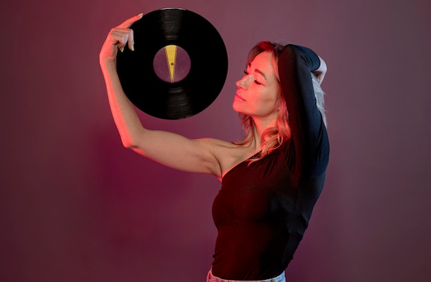 Side view woman with vinyl