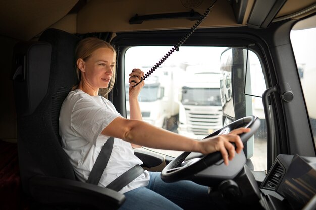 Side view woman working as a driver