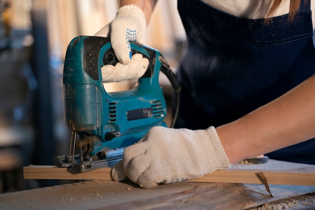 Side view woman working with gloves