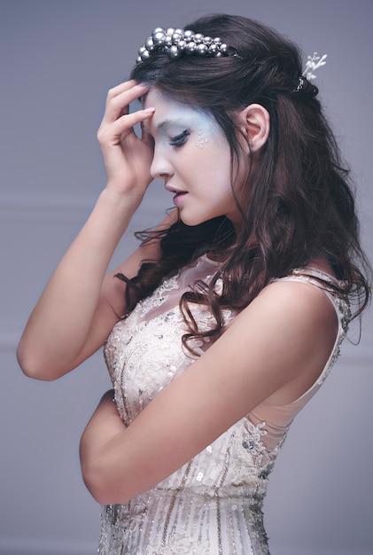 Side view of worried ice queen at studio shot