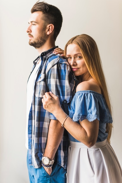 Free photo side view of a young couple