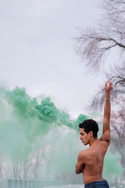 Side view young man dancing ballet