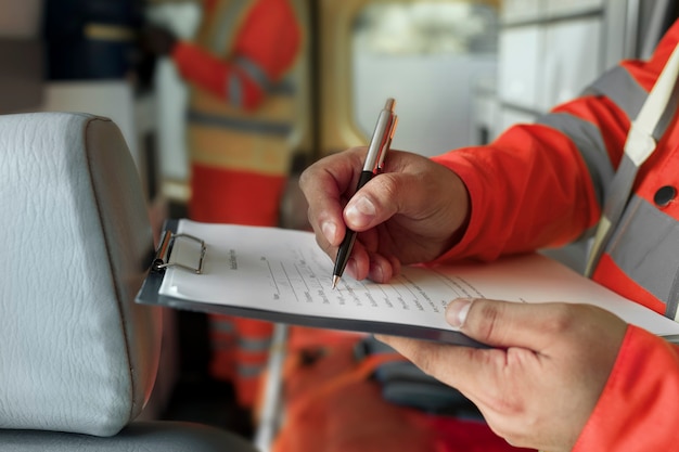 Sided view hand filling in document