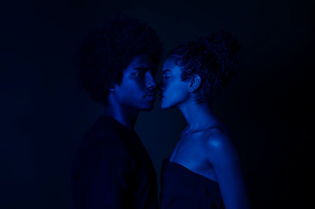 Sideways couple with black background
