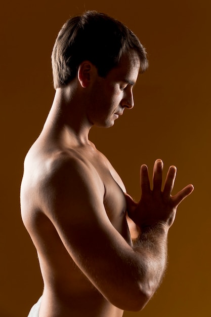 Sideways man meditating medium shot