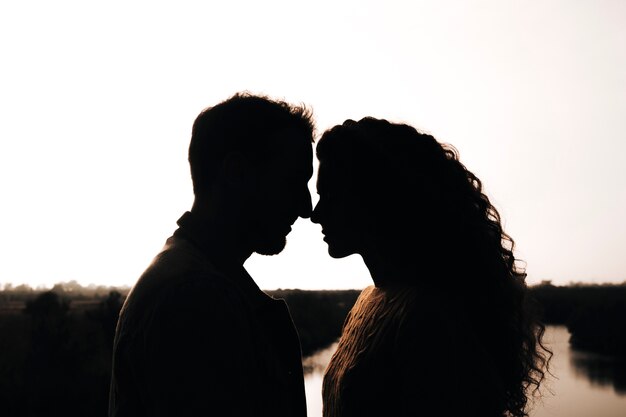 Sideways silhouette of a couple