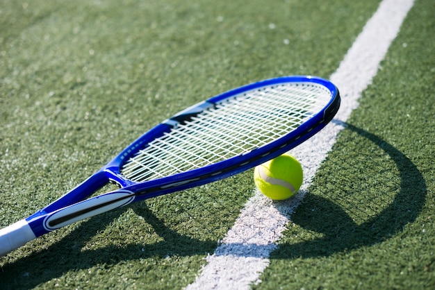 Sideways tennis racket on the ball